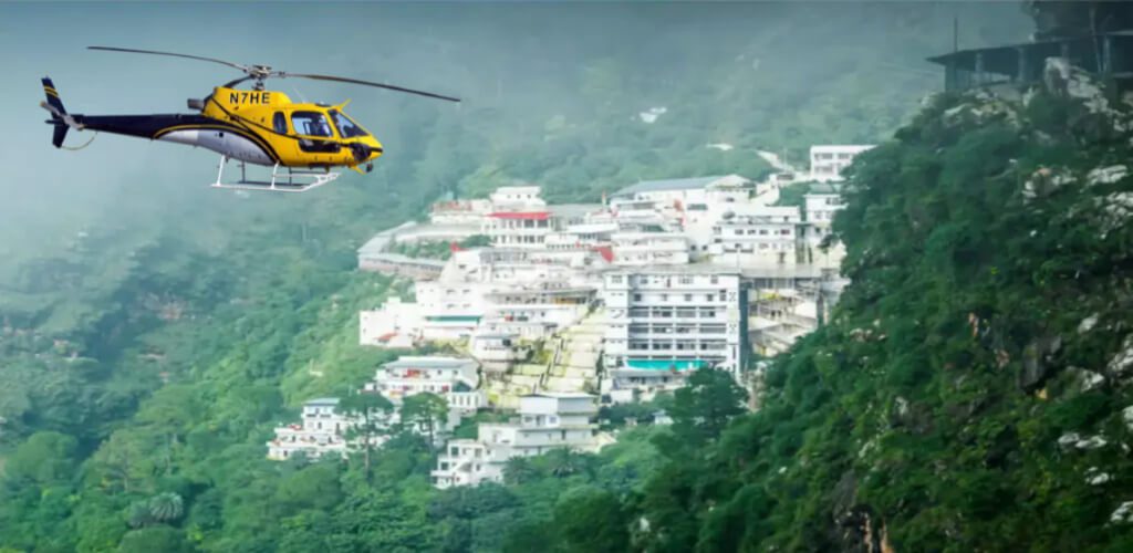 helicopter flying over the Trikuta Mountains